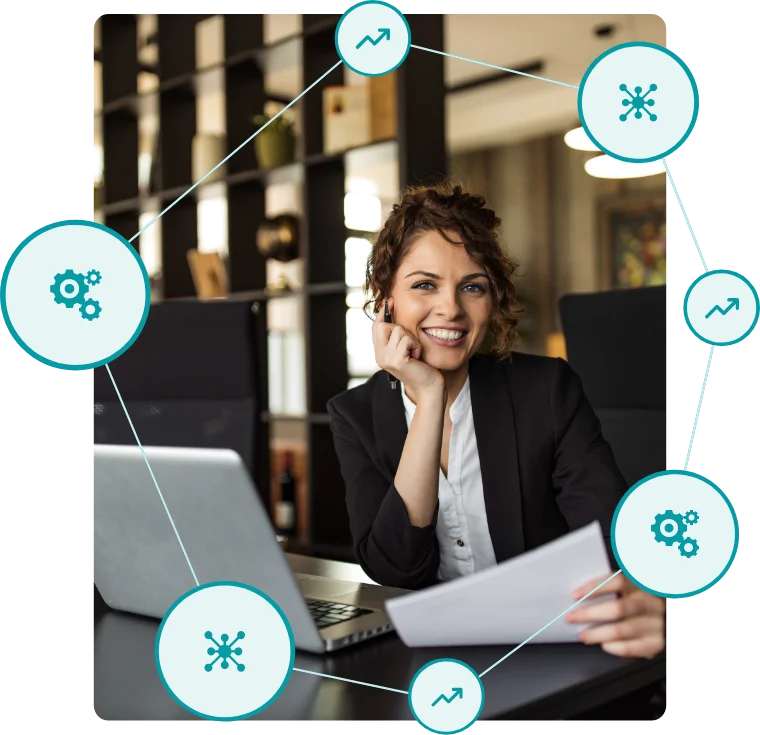 Businesswoman sitting at a laptop surrounded by symbols representing the customisable frameworks and integrations of Cognology's Competency Management System